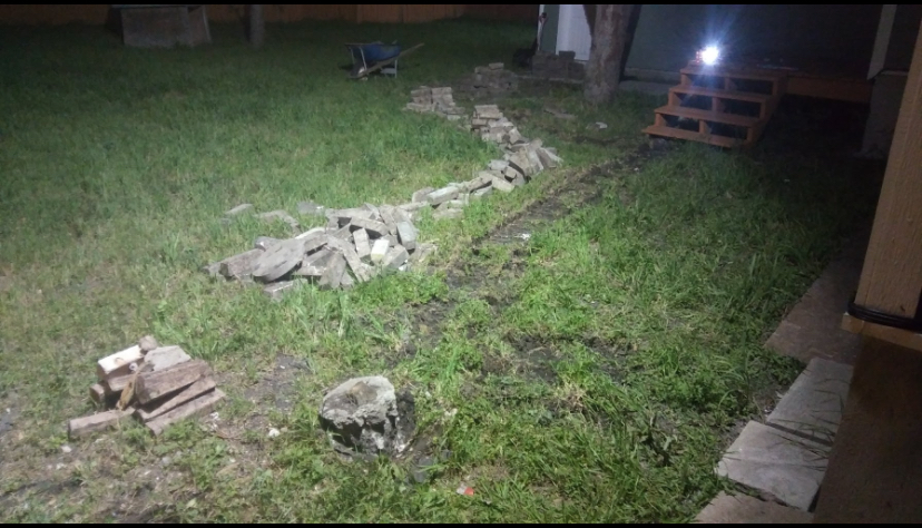 Backyard walkway area before landscaping work began